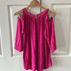 Off shoulder 3/4 length sleeve. Lace around neck line and sleeves